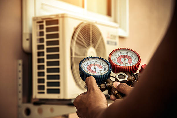 Professional Hvac technician working in Camden, AL